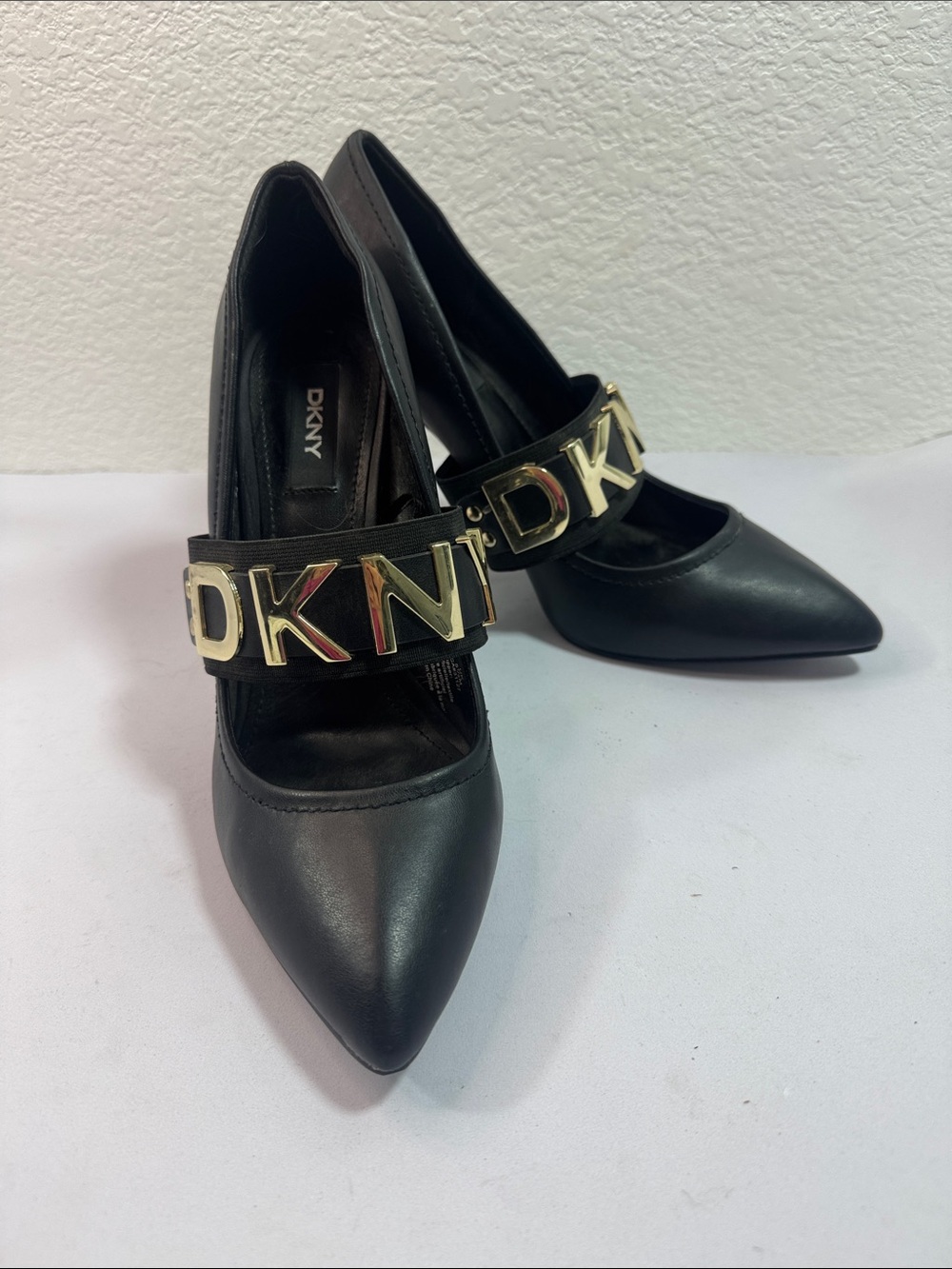 DKNY Black Pointed-Toe Mary Jane Pumps with Gold Logo Strap